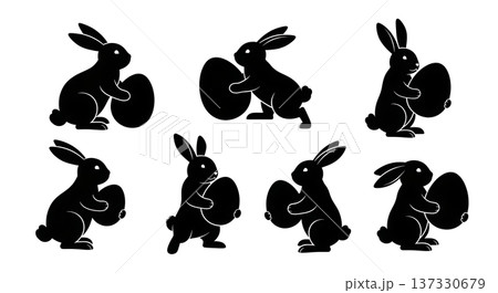 Black Solid Bunnies Holding Eggs Silhouettes Set of Six on White Background Black Solid Bunnies Holding Eggs Silhouettes Set of Six on White Background 137330679