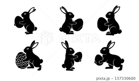 Black Solid Bunnies Holding Eggs Silhouettes Set of Six on White Background Black Solid Bunnies Holding Eggs Silhouettes Set of Six on White Background 137330680