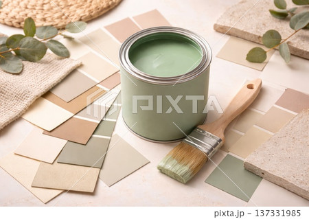 Green paint can with brush and neutral color palette samples for interior design Green paint can with brush and neutral color palette samples for interior design 137331985