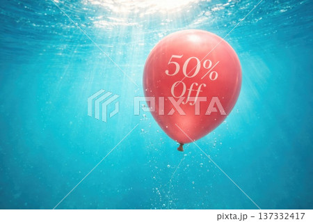 Red balloon with 50 percent discount floating underwater promotional concept Red balloon with 50 percent discount floating underwater promotional concept 137332417