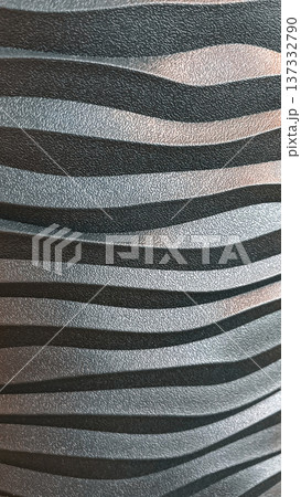 Dark abstract background of black wavy texture with elegant curves and modern 3D relief surface. Dark abstract background of black wavy texture with elegant curves and modern 3D relief surface. 137332790