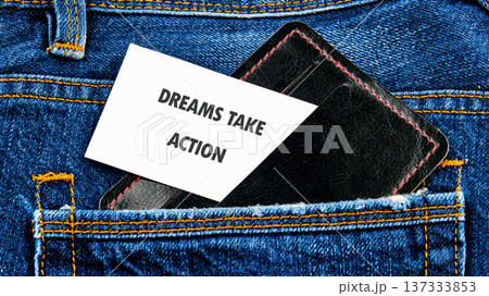 White card, Dreams Take Action, from blue jean pocket with black wallet. It inspires drive White card, Dreams Take Action, from blue jean pocket with black wallet. It inspires drive 137333853