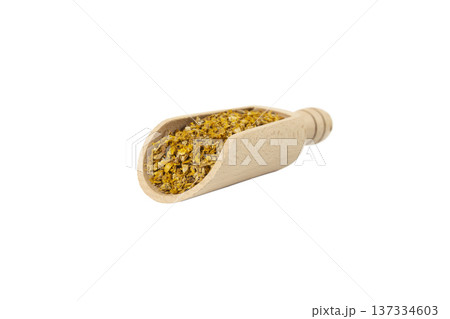 Mullein or Verbascum dried flowers in wooden scoop isolated on white background. Used in herbal medicine. Mullein or Verbascum dried flowers in wooden scoop isolated on white background. Used in herbal medicine. 137334603