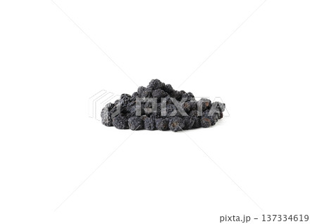 Dried Aronia or black chokeberry - Aronia melanocarpa in latin heap isolated on white background. 137334619