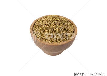 dried flowers of black lilac or black elder in latin sambuci flos in wooden bowl isolated on white background.Herbs. Alternative medicine. 137334630