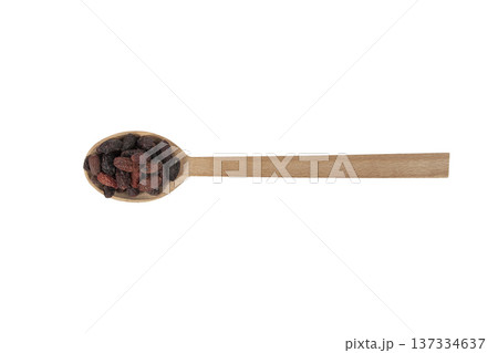 Dogwood or Cornel fruit herb used in herbal medicine on wooden spoon isolated on white background.  Herbs. Alternative medicine. 137334637