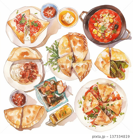 Various dishes served on a table during a festive gathering in the evening in a cozy dining setting 137334819