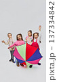 Young girls standing with colorful umbrella wearing mid season kids fashion outfits in studio 137334842