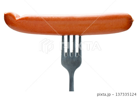 Appetizing sausage on a fork, isolated on white background Appetizing sausage on a fork, isolated on white background 137335124