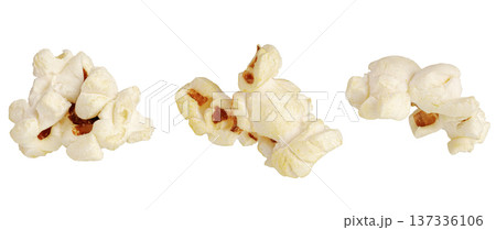 Delicious white popcorn kernels isolated on white. Concept of movie watching, leisure and fun. 137336106