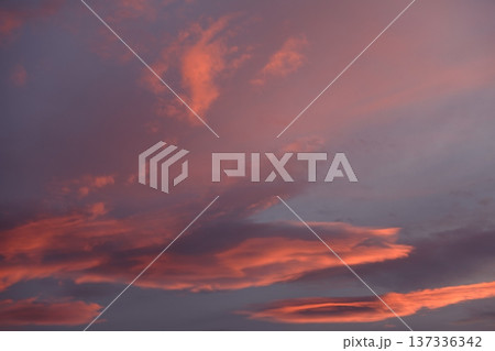 Red colored clouds at sunset Red colored clouds at sunset 137336342