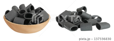 Black pasta with cuttlefish ink in wooden bowl isolated on white background 137336830