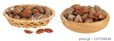 pecan nut in a wicker basket isolated on white background with full depth of field pecan nut in a wicker basket isolated on white background with full depth of field 137336836