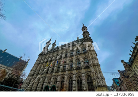 Gothic architecture of Leuven town hall with christmas preparations 137336959