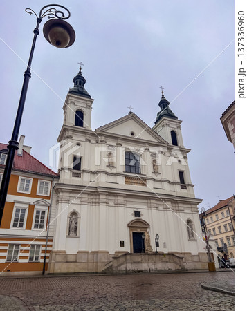 Church of the Holy Spirit, Warsaw stands in town square on a cloudy day 137336960