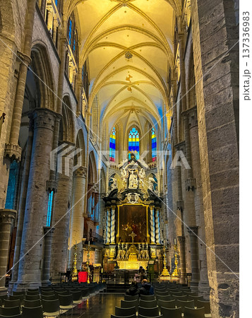 Church Interior Featuring Stained Glass Windows and Altar Surrounded by Columns Church Interior Featuring Stained Glass Windows and Altar Surrounded by Columns 137336983