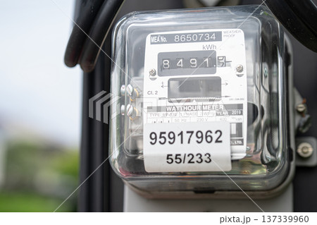 Electric measuring power meter for energy cost at home and office. 137339960