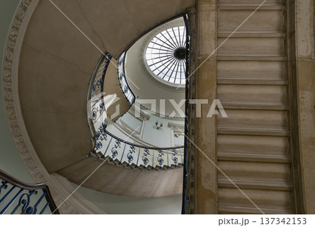 the Nelson Staircase within Somerset House in London, a grand spiral staircase inside a neoclassical building, the Nelson Staircase within Somerset House in London, a grand spiral staircase inside a neoclassical building, 137342153