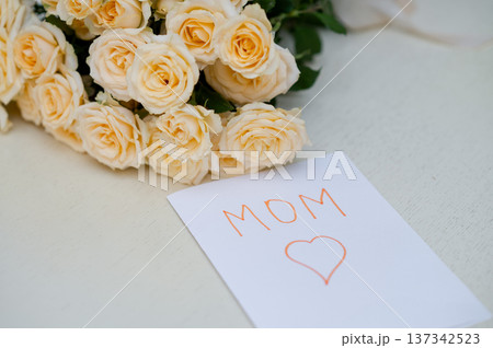 Childrens handmade greeting card for Mothers Day with a fresh yellow rose bouquet, Childrens handmade greeting card for Mothers Day with a fresh yellow rose bouquet, 137342523