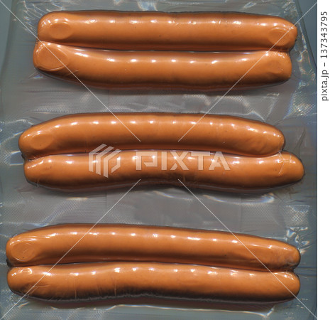 vacuum-packed sausages 137343795