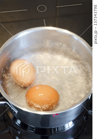eggs in boiling water 137343798