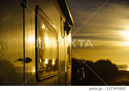 Camper car on nature at sunrise Camper car on nature at sunrise 137343842