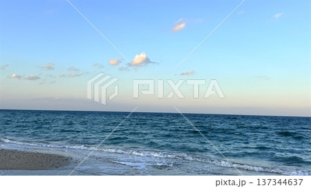 Vast Blue Seascape. Wide Ocean With Distant Horizon And Shimmering Surface. Breathtaking Panoramic Turquoise Sea With Refreshing Coastal Breeze And Sparkling Surface 137344637