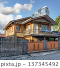 Traditional Malay house against modern high-rise buildings in Kampong Bharu, Kuala Lumpur, Malaysia 137345492