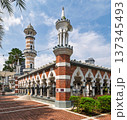 Sultan Abdul Samad Jamek Mosque courtyard, featuring minarets and Moorish-style arches, Kuala Lumpur, Malaysia 137345493