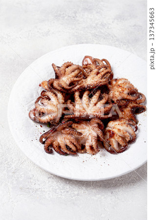 Baby octopus grilled on a white plate, homemade, no people, Baby octopus grilled on a white plate, homemade, no people, 137345663