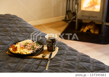 Relaxed morning with hearty breakfast and inviting atmosphere Relaxed morning with hearty breakfast and inviting atmosphere 137345861