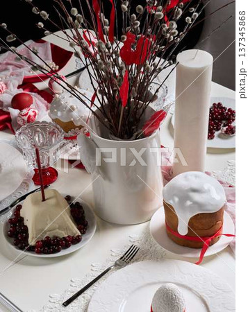Elegant seasonal decor. Decor featuring flowers and candles 137345868