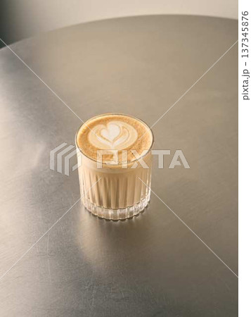 Artistic depiction featuring solitary coffee cup with refined details 137345876