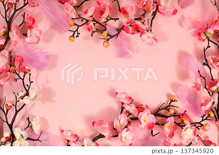 Abstract spring floral arrangement with pink sakura branches on sunny background, elegant colorful banner and template for your creative work, spring arrival concept, postcard with space for text. Abstract spring floral arrangement with pink sakura branches on sunny background, elegant colorful banner and template for your creative work, spring arrival concept, postcard with space for text. 137345920