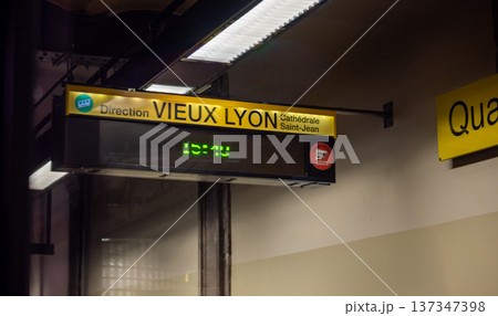 Lyon, france. December 27,2023. Subway station directional sign in lyon indicating trains to vieux lyon and cathedrale saint-jean on digital display 137347398