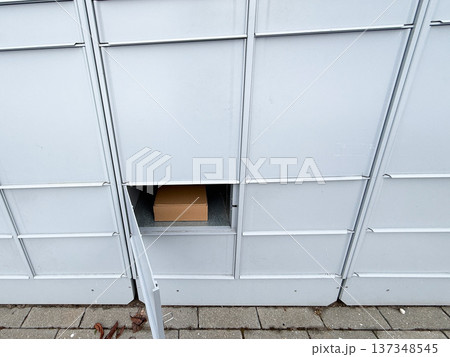 Package delivery in residential parcel locker box. Package delivery in residential parcel locker box. 137348545