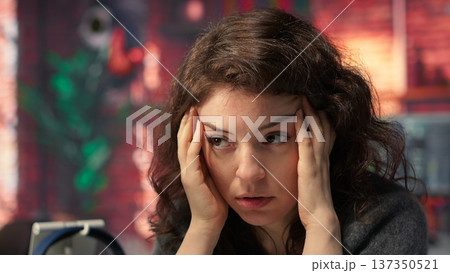 Business professional being devastated with monetary losses and bankruptcy, watching stock exchange trends go downward. Investor trader feeling worried and upset with the market crash. Camera B. Business professional being devastated with monetary losses and bankruptcy, watching stock exchange trends go downward. Investor trader feeling worried and upset with the market crash. Camera B. 137350521
