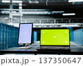 Close up of isolated screen laptop and tablet in high tech data center used to troubleshoot infrastructure. Mockup devices in server room running software development tools, resolving system crashes 137350647