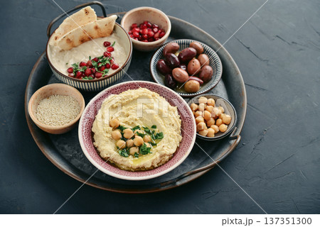 Middle eastern, arabic traditional breakfast with hummus, falafel, mutabbal, 137351300