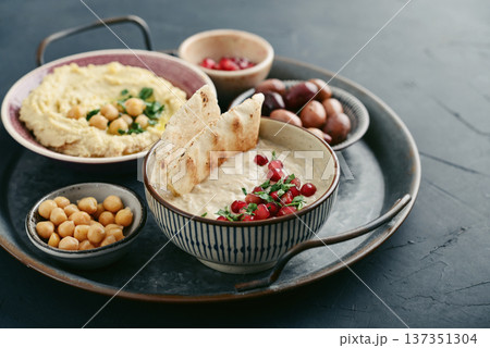 Middle eastern, arabic traditional breakfast with hummus, falafel, mutabbal, Middle eastern, arabic traditional breakfast with hummus, falafel, mutabbal, 137351304