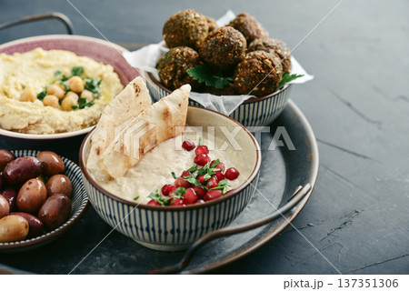 Middle eastern, arabic traditional breakfast with hummus, falafel, mutabbal, 137351306