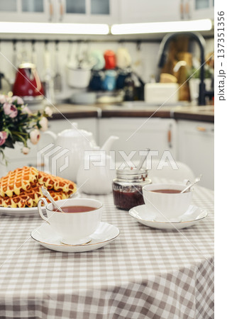 breakfast with tea and a homemade Belgian waffles breakfast with tea and a homemade Belgian waffles 137351356