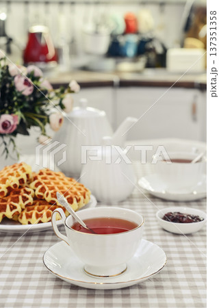 breakfast with tea and a homemade Belgian waffles breakfast with tea and a homemade Belgian waffles 137351358