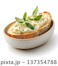 Creamy Mashed Potato Served in Artisan Bread Bowl with Fresh Basil Garnish 137354788