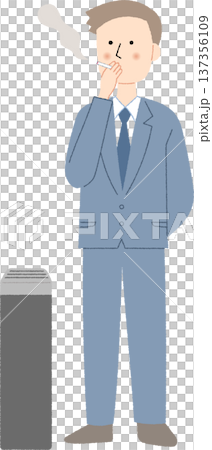 一名年輕的男性上班族在吸菸區抽煙。 一名年輕的男性上班族在吸菸區抽煙。 137356109