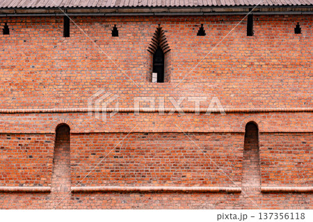 Nizhny Novgorod Kremlin brick wall detail with embrasures and medieval architecture Nizhny Novgorod Kremlin brick wall detail with embrasures and medieval architecture 137356118