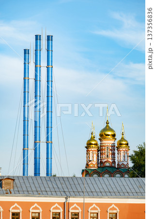 Moscow architecture creating contrast with modern industrial chimneys and golden domes Moscow architecture creating contrast with modern industrial chimneys and golden domes 137356836