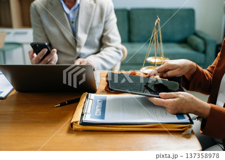 Business and Male lawyer or judge consult having team meeting with client, Law and Legal services Business and Male lawyer or judge consult having team meeting with client, Law and Legal services 137358978