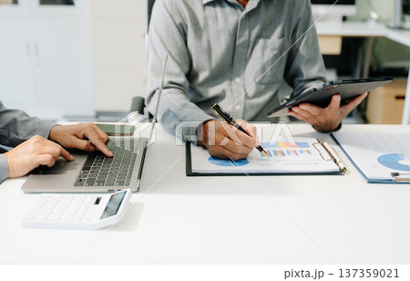 Business team meeting present.professional investor working with  Finance managers task 137359021