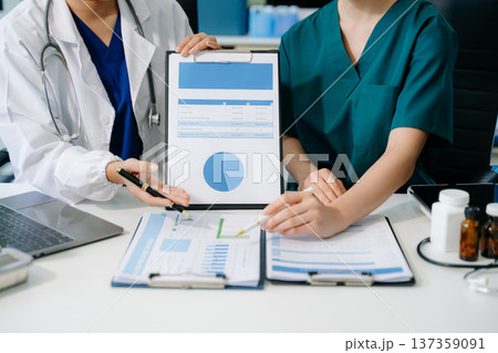Medical technology network team meeting concept. Doctor hand working with smart phone modern digital tablet 137359091